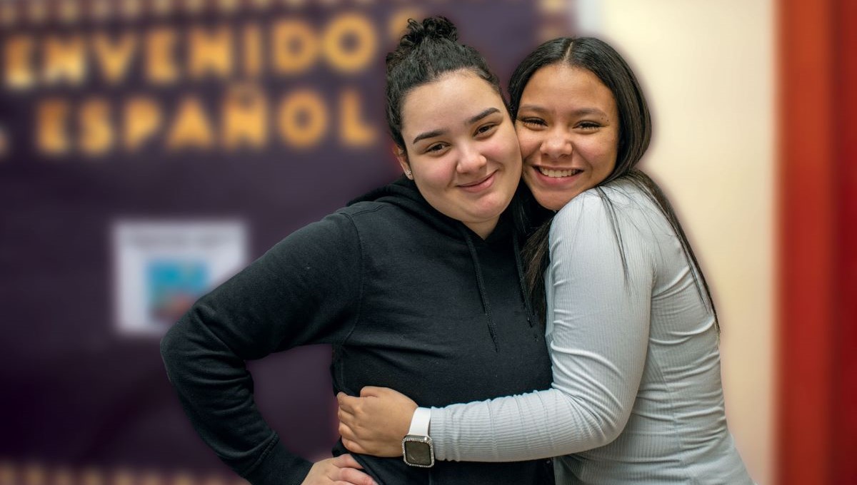 Young teens hugging